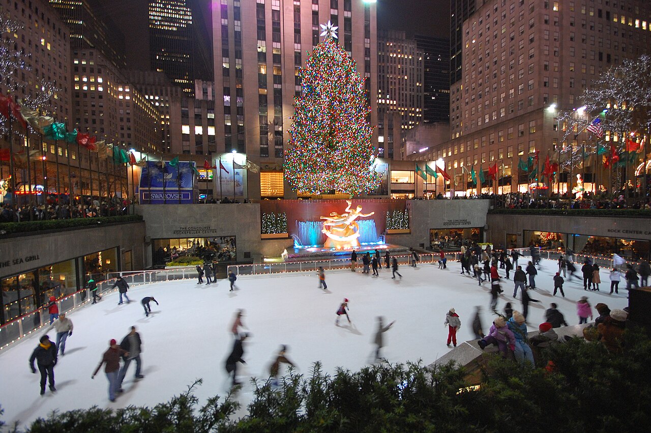 Skaters on The Rink with the tree behind